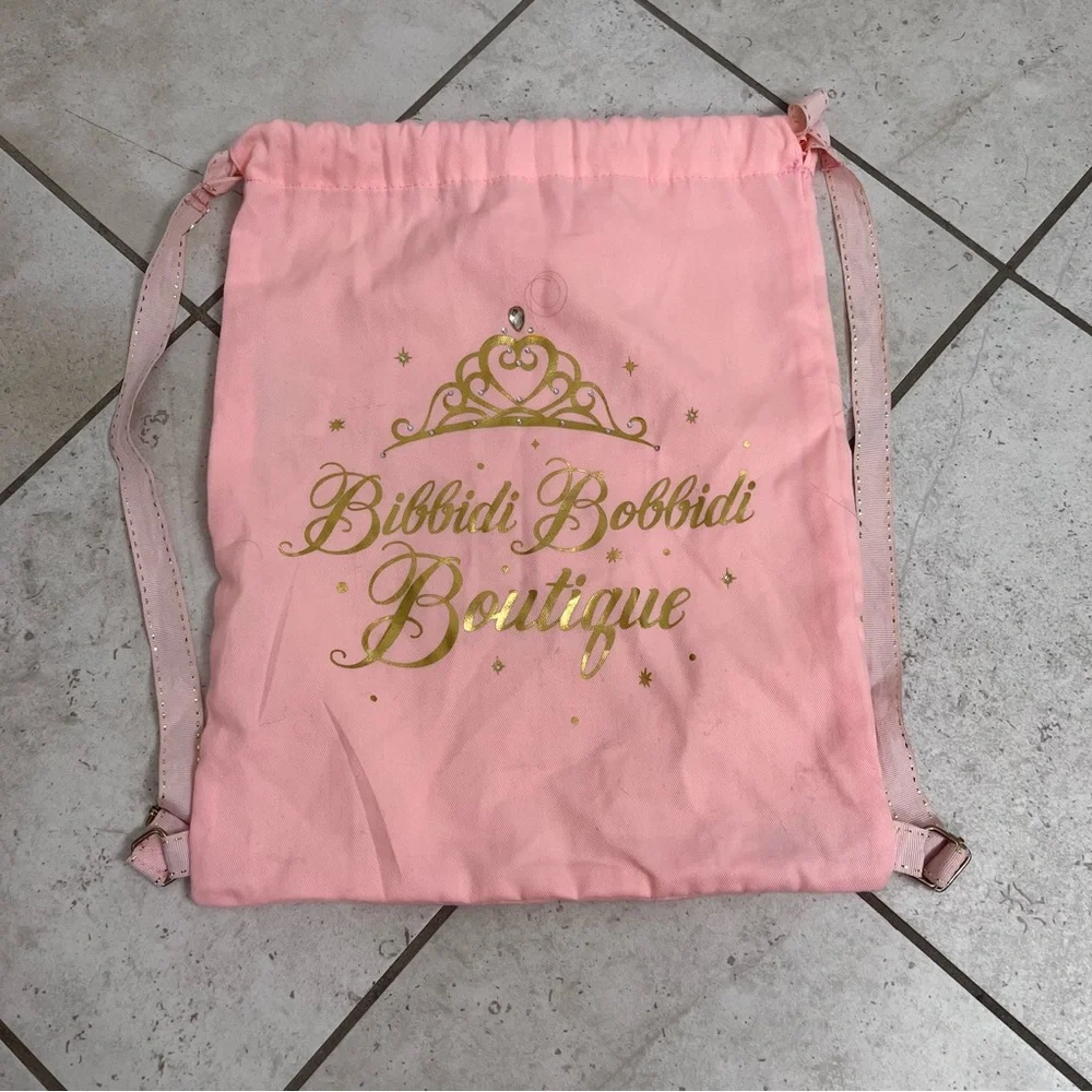 Disney Parks womens Bibbidi Bobbidi Boutique drawstring backpack pink